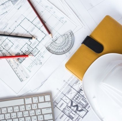 Precision blueprints and architectural plans for construction projects at MBC Construction Inc. showcasing detailed planning and design.